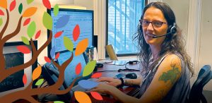 Addictions Counsellor, Melissa Abbey speaks with a member of the public who is interested in receiving care at Renascent.