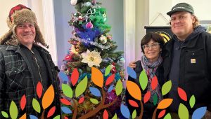 (Right to left) Renascent Alumni Duncan, his mother Beth, and his sponsor Sean at Renascent Madison Avenue Centre dropping off gifts for clients for the 2024 December Holiday Season.